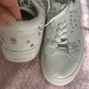 White Sneakers with Silver Star Accents